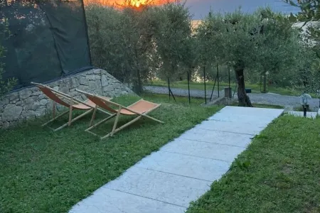 Lake view apartment with large hydromassage tub directly in the bedroom.