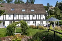 Spacious country house with open fireplace and garden in the Sauerland for young and old