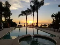 On the Gulf! Luxury 4/3 with 2 Master Bedrooms, Pool and Spa and Dock!