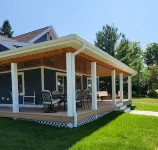 Newly renovated home with lake views, only one block from the beach! Hotels in Boyne City