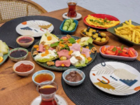 Lupia Suites โรงแรมในคาช