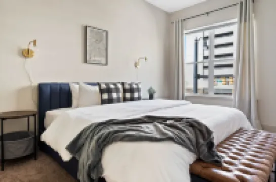 Stylish Open-Air Balcony and Modern Amenities - Chic Urban Haven Hotels in 