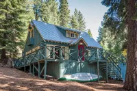 Darling mountain cabin with a private hot tub, WiFi, wood stove, & washer/dryer