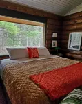The Copper Squirrel is a secluded full log cabin on 10 acres.