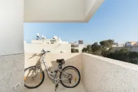 Bright 1Br Apartment w Balcony 10 Min Walk from Beach with Mamad by Sea N' Rent
