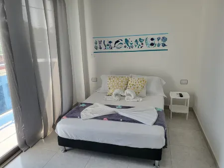 Hostal Casa Familiar Josi Отели в г. Толу