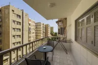 The Hospitable 2BDR Apt 5 min from CAI Airport Hotels in El Obour City