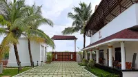 S Cross Munroe Island Resort Hotels near Ponmana Vattakayal View Point and tourism jetty