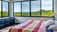 Huge, Breathtaking Hillside Home with Private Pool and Sweeping Views