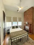 Charming 3-bedroom condo 700 ft from St. Charles Streetcar in Uptown New Orleans