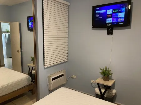 Your cozy 2-bedroom garden apartment at Villa Taina, WiFi, sleeps 6