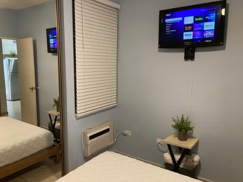 Your cozy 2-bedroom garden apartment at Villa Taina, WiFi, sleeps 6 카보조로 호텔