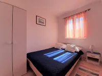 Apartment Tihana in the town of Krk with partial view, family-friendly