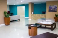 Gated 1-bedroom Condo in Portmore with AC, WiFi, Pool, Kitchen, TV, Beach View