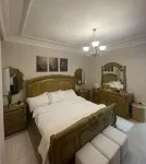 Sleeps 8 people! Apartment 5 minutes to Abdoun w balcony a in Dair Ghbar! Hotels in 