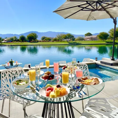"Luxury Lakefront Paradise: Heated Pool Haven with Unrivaled Views"