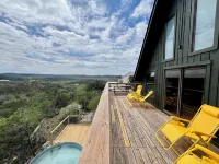 Design-forward Frio cabin with epic views & pool Hotels in Concan