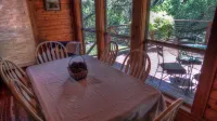 Cozy cedar/rock cabin & bunkhouse with private access to the Frio River.