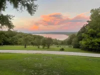 The Stone Schoolhouse - Gated Lakefront Acreage with views and historic charm