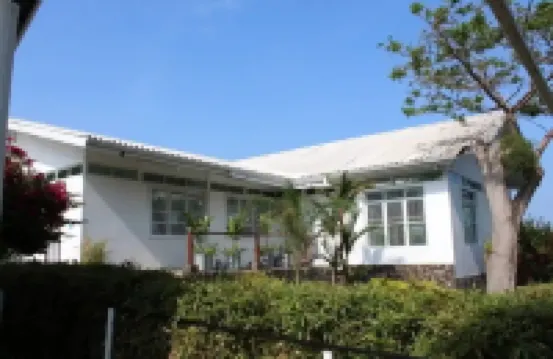 Large calm house surrounded by nature
