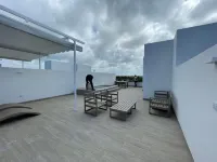 2 Bedroom Penthouse - with Rooftop Picuzzi.3 min to the beach!!