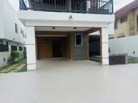 An amazing 4-bedroom townhome with WiFi,Outdoor jacuzzi in serene Sakumono,Accra