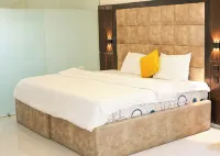 โอเอซิส โรงแรมและสวีท
