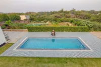 ELIVAAS Amaltas 4BHK Hideaway With Pool -  Ferienhäuser