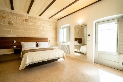 Donna Domenica Boutique Suites Hotels near Cala Paura