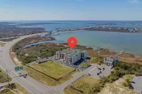 Sound front condo, pool, water access, & sunsets