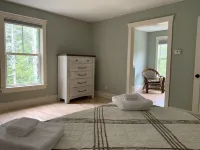 Newly built and fresh vacation home tucked in the woods of Mount Desert.
