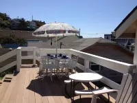 Charming Cozy Cottage w/ OceanView! Steps to Beach!!! W/ 2 large decks and WiFi!