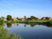 Small apartment in Dornumersiel with glazed balcony House Spieckeroog Hotels in Dornumersiel
