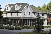 Two Bedroom Across from Outlet Pond on edge of village and wooded trails.