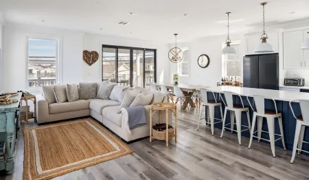 2 Master Bedrooms, Outdoor shower, Parking for 3 Cars, 2 blocks to beach.