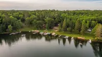 Tiny bungalow secluded in the woods with lake view.  Pets accepted!