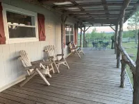 Mountain views, wrap around porch, incredible lawn with fire pit!!