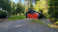 Fish, kayak or relax at a riverfront cabin in the woods of Rainier, Washington!