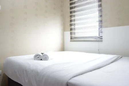 Strategic & Relaxing 2Br at Gateway Apartment Ahmad Yani Cicadas