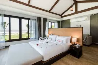 Triple Tree Beach Resort - balcón