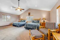Spacious lakefront home with deck, private dock, four fireplaces, & W/D