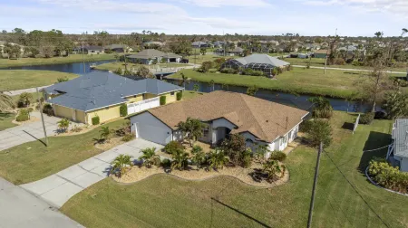 Welcoming Pool Home on Canal Short Trip to Beaches