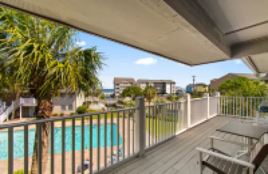 Shared Pool and Ocean View Balcony - Charming Coastal Oasis
