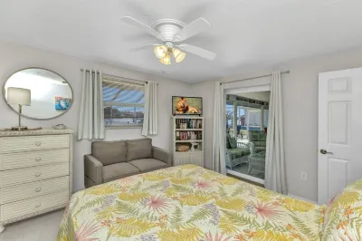 Waterfront House with Heated Pool and Fishing Dock Hotels near Publix Super Market at Quesada Commons