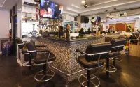 旅行者休息運動酒吧酒店 - 家庭旅館