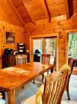 4-bedroom cabin in peaceful Apple Valley with AC, WiFi. Enjoy nature retreat.
