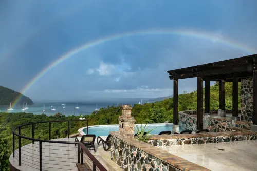 Walk to world famous Maho Bay! Privacy, views, pool, 4 equal king size bedrooms.