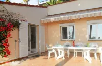 House with garden beach Scudo Hotels near Pointe de la Parata