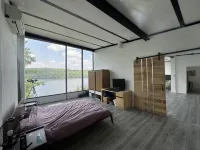 Modern Glass Cottage facing Lake with Hot tub Hotels in Algonquin Highlands