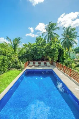 Large modern villa with pool on West Coast near beach & restaurants w/ parking.